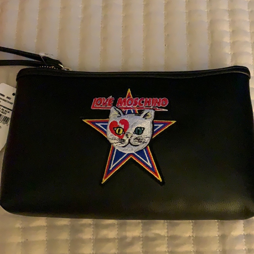 ON SALE !!! Love Moshchino wristlet SALE!!!!!